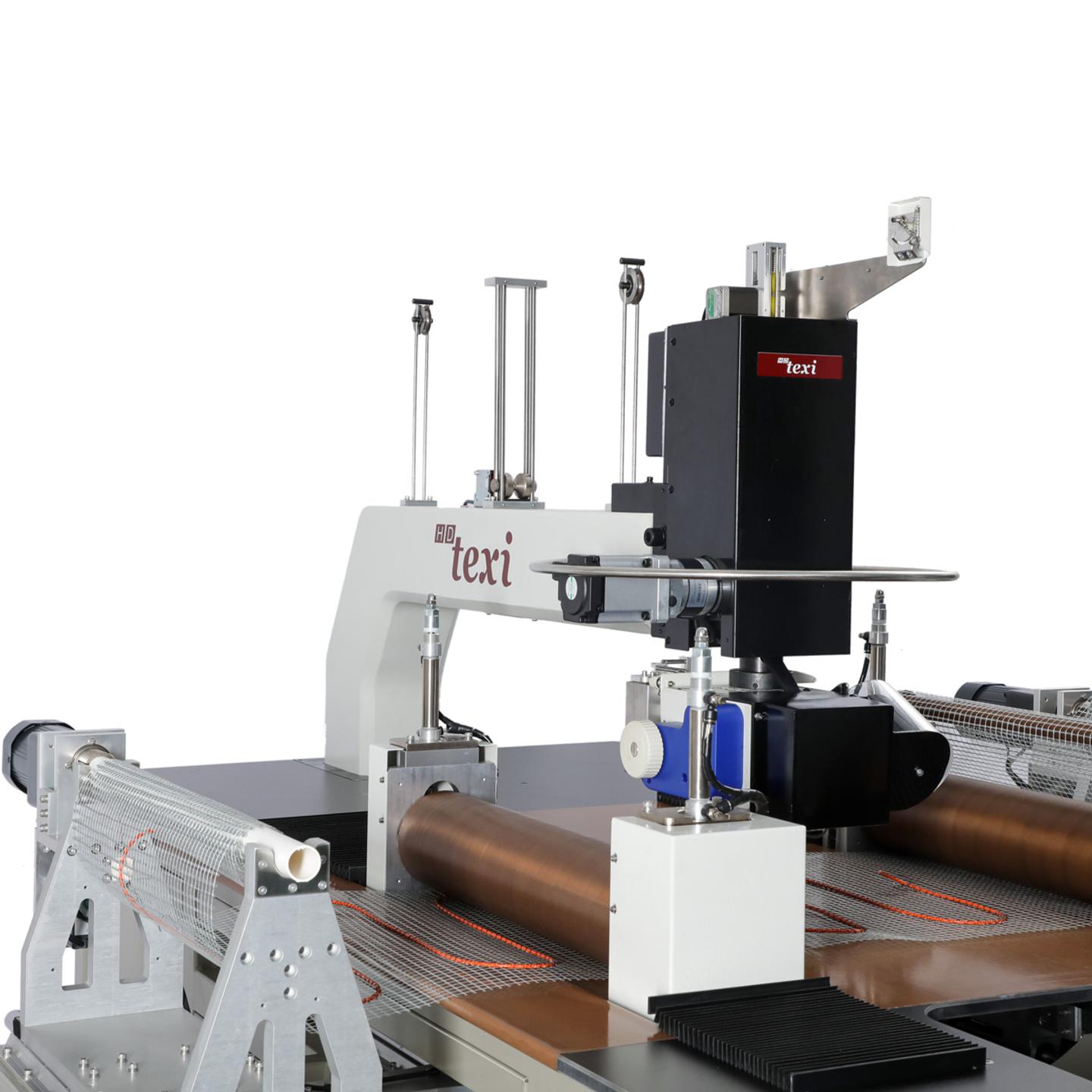 Automatic machine for sewing a resistance wire onto heating mats