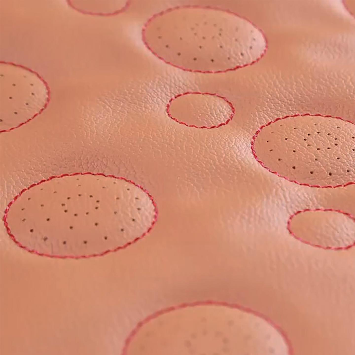 Multifunctional machine for sewing and perforating coated fabrics and leather