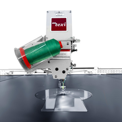 Programmable sewing machine with independent drives