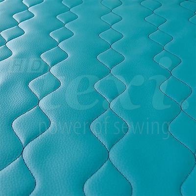 Maszyna do stebnowania programowanych wzorów z podnoszoną i obrotową głowicą szyjącą - maszyna kompletna