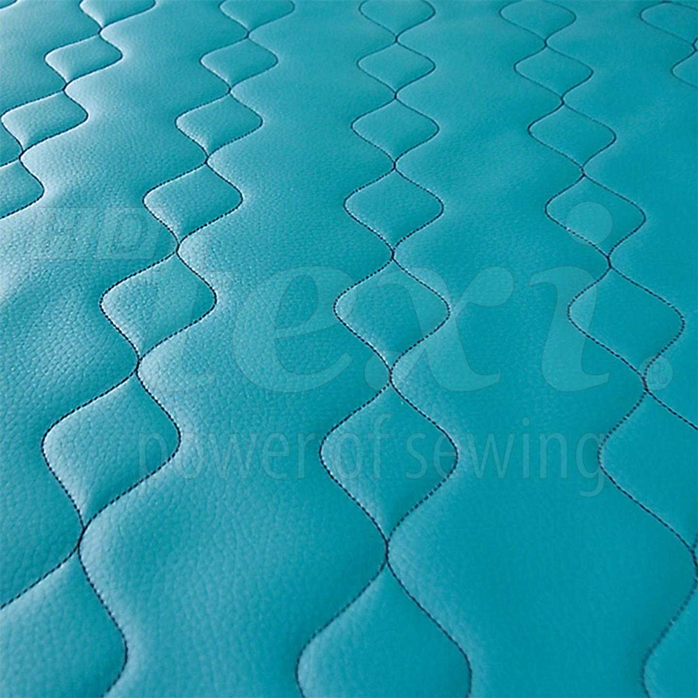 Maszyna do stebnowania programowanych wzorów z podnoszoną i obrotową głowicą szyjącą - maszyna kompletna