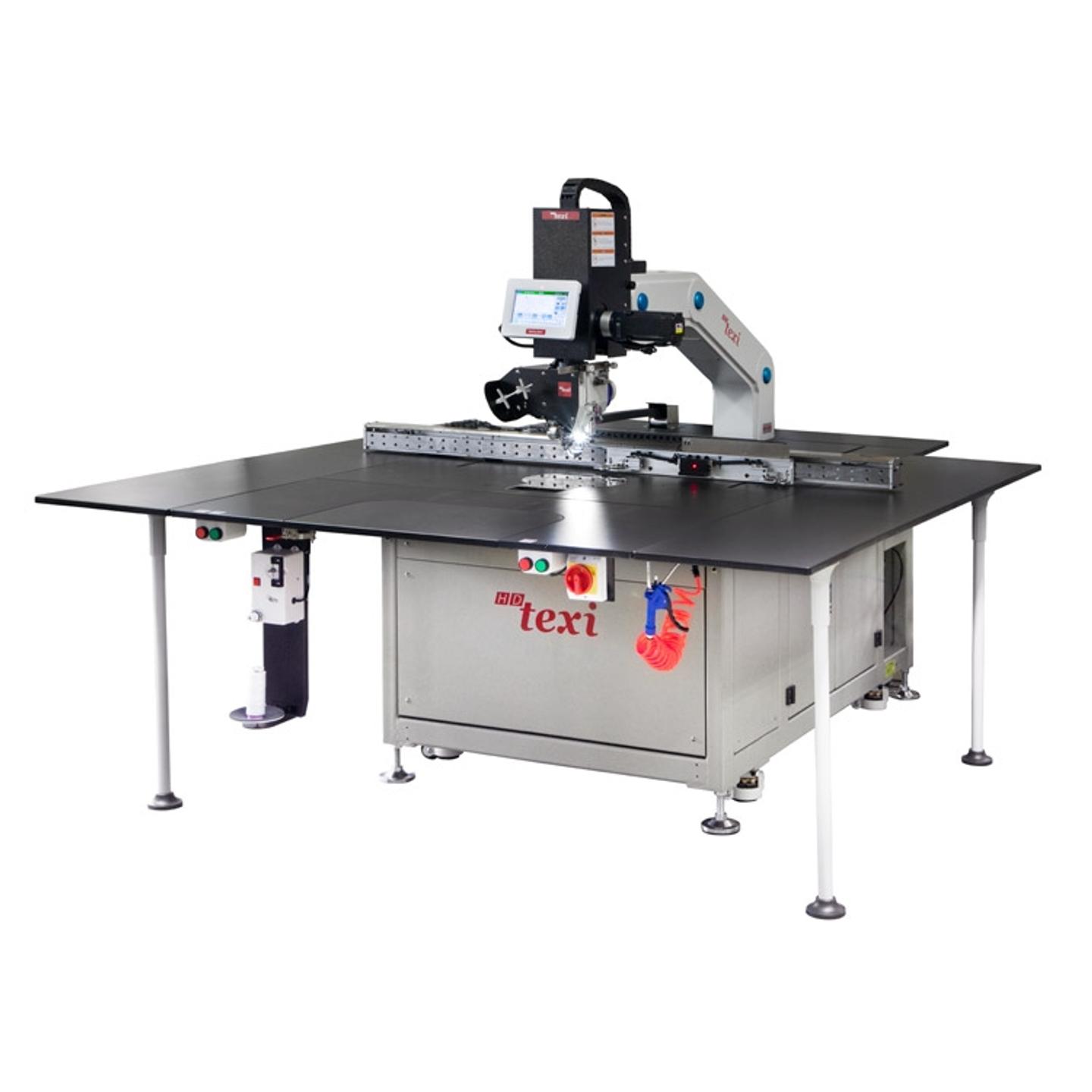 Maszyna do stebnowania programowanych wzorów z podnoszoną i obrotową głowicą szyjącą - maszyna kompletna