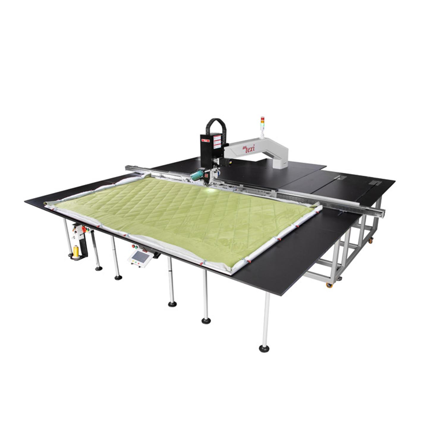 Programmable sewing machine with liftable rotary sewing head and independent drives with extra large sewing field