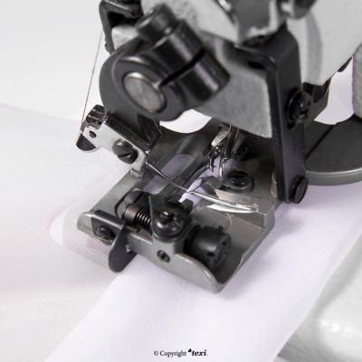 Portable blind stitch machine for light and medium fabrics