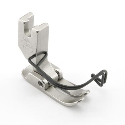 Needle feed foot with needle guard